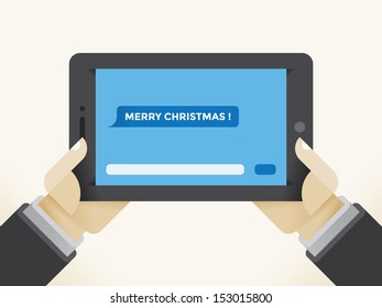 Tablet computer with SMS message "Merry Christmas!"