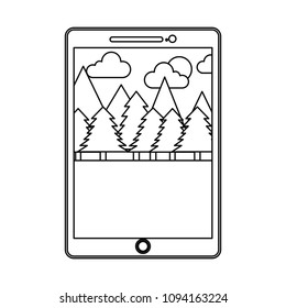 tablet electronic with image of landscape and pine trees