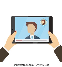 Tablet in hands. People on the screen. Online call.