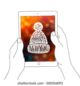 Tablet in his hands with a Christmas picture. Winter hat with lettering Happy New Year. Lettering with a pattern of swirls and scription. Illustration on a white background.