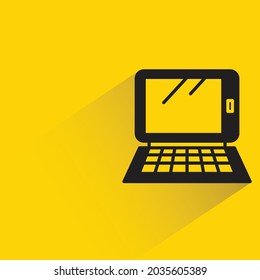 tablet with keyboard on yellow background