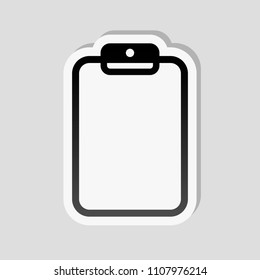 Tablet with paper. Sticker style with white border and simple shadow on gray background
