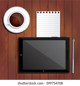 Tablet PC, black coffee, notebook sheet, pen on the table