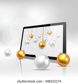 Tablet PC with Christmas decorations on white background
