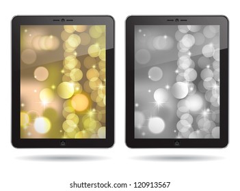 tablet PC with gold and silver abstract backgrounds