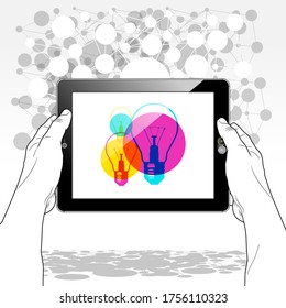A Tablet PC horizontally held firmly in both hands. 3 "Idea concept" icons are presented on screen.
