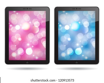 tablet PC with pink and blue abstract backgrounds