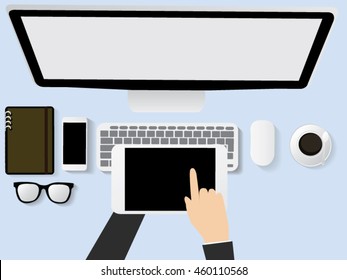 tablet pc screen held by businessman hands on desk office - online, top view