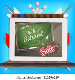 Tablet with a picture of a chalkboard with the sentence back to school written in it, on a rustic wooden desk with pencil different colors. EPS 10 vector file included