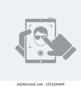 Tablet take a photo to guy
