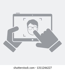 Tablet take a photo to guy
