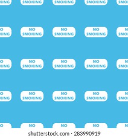 Tablet with text NO SMOKING, repeated in straight lines on blue background