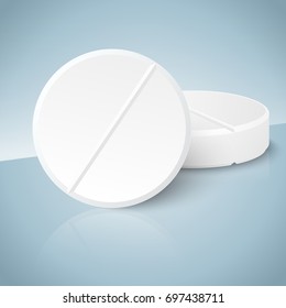 Tablets and pills isolated on blue