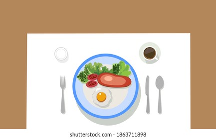 Tableware with fork spoon knife and coffee. Western style food, steak, fried eggs, tomatoes and vegetables. 