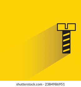 tack and nail with shadow on yellow background