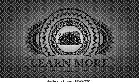 taco icon and Learn more text dark abstract realistic emblem. Pattern fashionable background. Illustration. 