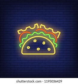 Taco neon sign. Glowing taco banner. Night bright advertisement. Food concept. Vector illustration for night snack bar or restaurant. 