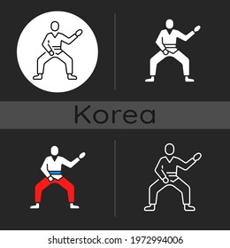 Taekwondo dark theme icon. Martial arts. Karate fighter. Korean culture. Warrior training for tournament. Linear white, simple glyph and RGB color styles. Isolated vector illustrations