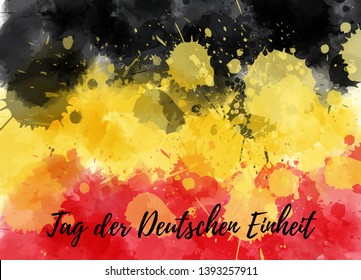 Tag der Deutschen Einheit - German Unity day in German language. Abstract watercolor splashes painted flag of Germany. Unity day holiday background.