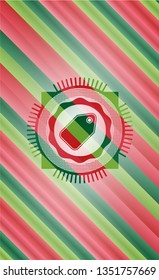 tag icon inside christmas colors style badge.
