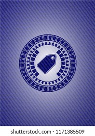 tag icon inside denim background