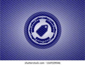 tag icon inside emblem with denim texture