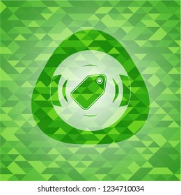 tag icon inside green mosaic emblem