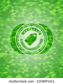tag icon inside green mosaic emblem