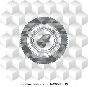 tag icon inside grey badge with geometric cube white background