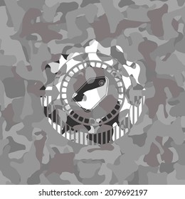 tag icon inside grey camo texture. 
