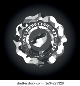 tag icon inside grey camouflage texture
