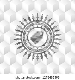 tag icon inside grey emblem with geometric cube white background