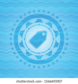 tag icon inside light blue water style badge.