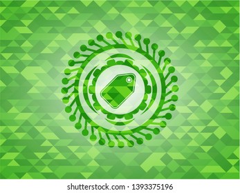 tag icon inside realistic green mosaic emblem