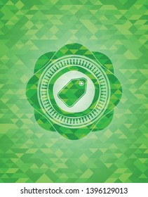 tag icon inside realistic green mosaic emblem