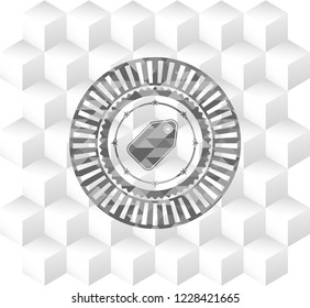 tag icon inside realistic grey emblem with geometric cube white background