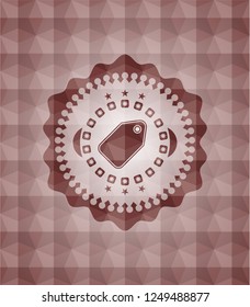 tag icon inside red seamless badge with geometric pattern background.