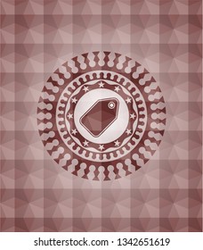 tag icon inside red seamless badge with geometric pattern background.
