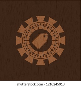 tag icon inside retro style wood emblem