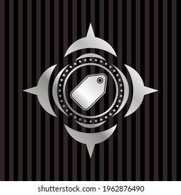 tag icon inside silver emblem. 