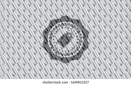 tag icon inside silver shiny badge. Scales pattern. Vector Illustration. Detailed.