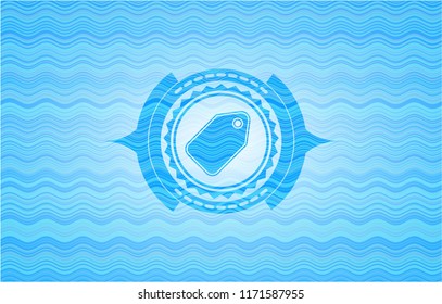 tag icon inside sky blue water wave emblem.