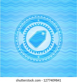 tag icon inside sky blue water badge background.