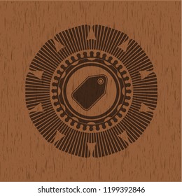 tag icon inside vintage wooden emblem