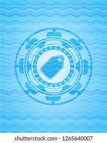 tag icon inside water representation style emblem.