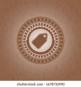 tag icon inside wooden emblem. Retro