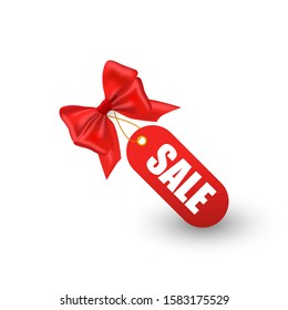 Tag with a sale, realistic bow with a shadow. Shopping sale and discounts. Vector illustration.
