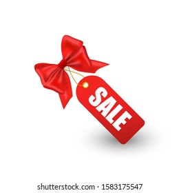 Tag with a sale, realistic bow with a shadow. Shopping sale and discounts. Vector illustration.
