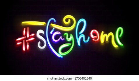 Tag Stayhome. Neon light shiny vector phrases on night brick background