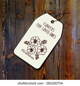 Tag template with bouquet of anemones on wood background. Suitable for floral shops. wedding designs, web and print